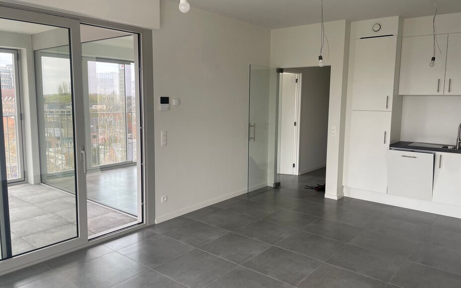 Leemans Immobiliën presenteert u  dit energiezuinig nieuwbouwappartement, gelegen op een toplocatie in het bruisende centrum van Aalst. Dankzij de uiterst centrale ligging bevinden winkels, het ziekenhuis, sportfaciliteiten, scholen en openbaar vervoer z