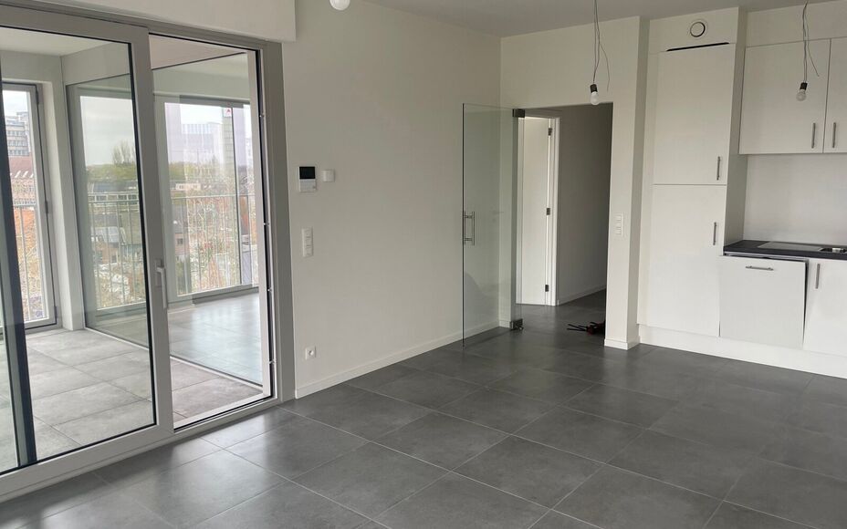 Leemans Immobiliën presenteert u  dit energiezuinig nieuwbouwappartement, gelegen op een toplocatie in het bruisende centrum van Aalst. Dankzij de uiterst centrale ligging bevinden winkels, het ziekenhuis, sportfaciliteiten, scholen en openbaar vervoer z